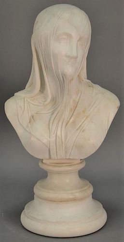 Large white marble bust of a woman with a vail over her head and face on a two-part swivel base.  ht. 24 1/2in., wd. 14in.