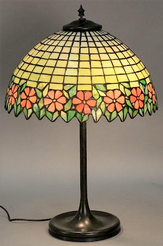 Pink flower leaded and mosaic glass table lamp on bronze base.  ht. 24in., dia. 16 1/4in., shade ht. 8in.