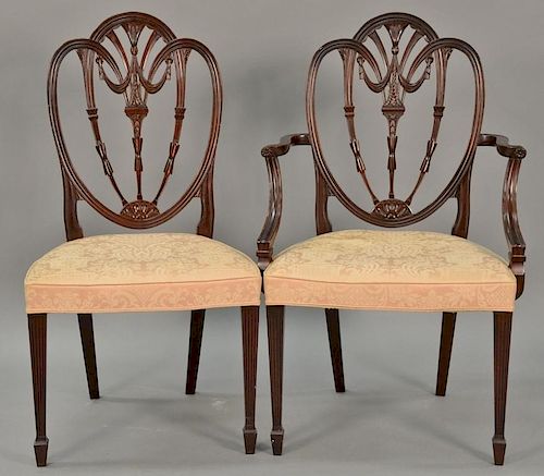 Margolis mahogany set of six dining chairs with pierce carved backs and upholstered seats, all set on square tapered and flut