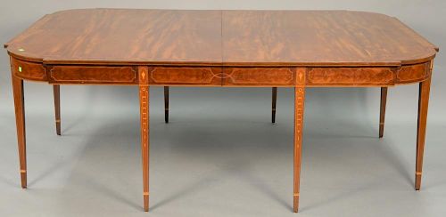 Margolis mahogany dining table having banded inlaid top with D shaped ends on conforming frieze, all on bookend panel and rin