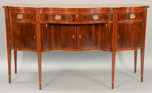 Margolis mahogany sideboard, Federal style with shaped top over conforming case with one center drawer flanked by two drawers