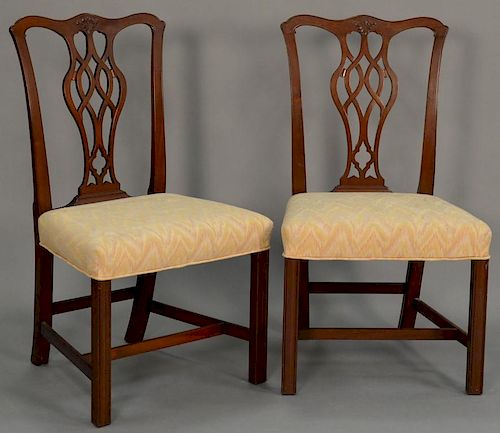 Pair of Margolis Chippendale style side chairs with intertwined carved backs and upholstered seats all set on molded square l