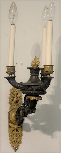 Pair of French Empire gilt and patinated bronze three light sconces having foliate back plate with single arm extending to an