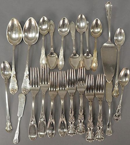 Silver lot with spoons and forks including two Tiffany forks along with two silverplate pieces. Tiffany fork: lg. 6 3/4in. to