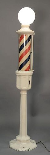 Theo Kochs free standing barber pole, white enameled with iron base and lighted globe top. 
ht. 80in. 

Provenance: Property 