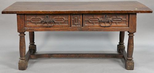Slab top table with two drawers on block and turned legs with H stretcher, probably Spanish or Italian 17th century.  ht. 31 