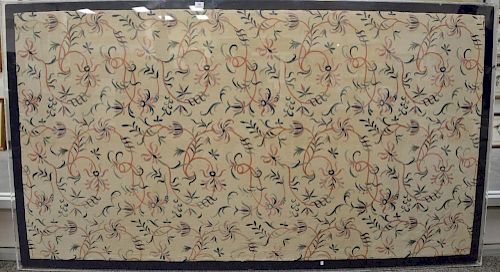 Textile panel with embroidered floral designs, probably 18th century, mounted on cloth in plexiglass. textile: 46" x 86", ove