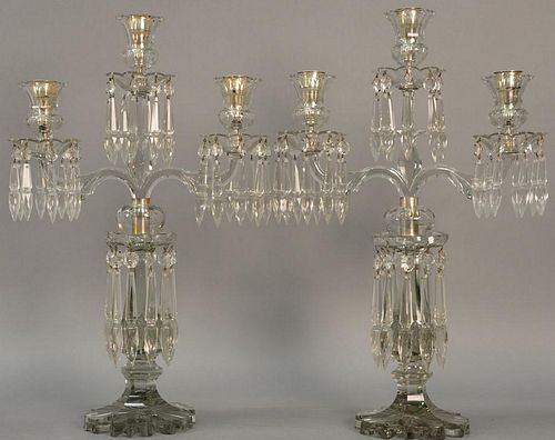 Pair of Anglo Irish crystal candelabra having three lights, each with prisms.
ht. 21 1/2in. 
Provenance: Nadeau's Auction Gal