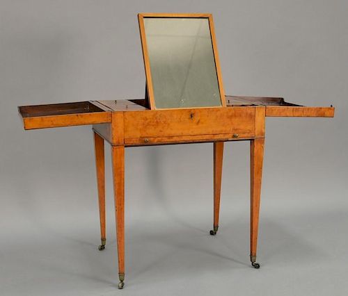 Fruitwood poudreuse with two hinged tops opening to reveal covered compartments and adjustable mirror, front with pull out sl