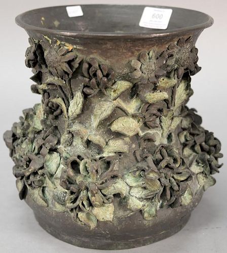 Large bronze vase with molded flowers and leaves around exterior.  ht. 9 1/2in., dia. 8 1/2in.