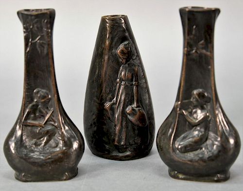 Peter Tereszczuk (1895-1925) 
Three bronze vases including a pair with nearly nude women playing instruments and the other ha