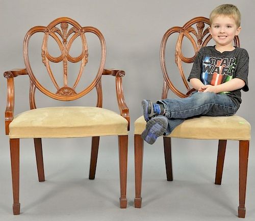 Fineberg set of six Federal style dining chairs, four side and two arm with heart shaped back having carved plume.