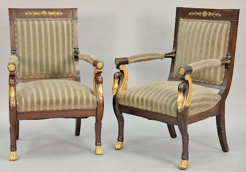 Pair of Continental mahogany armchairs with metal mounts, claw feet, and bird's heads, 19th century. ht. 38in., wd. 25in.