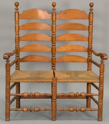 Wallace Nutting ladder back two seat settee (one seat with minor imperfection). ht. 50in., wd. 43in.