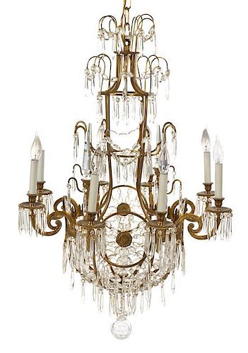 A Neoclassical Style Gilt Metal and Glass Six-Light Chandelier, Height 37 inches.