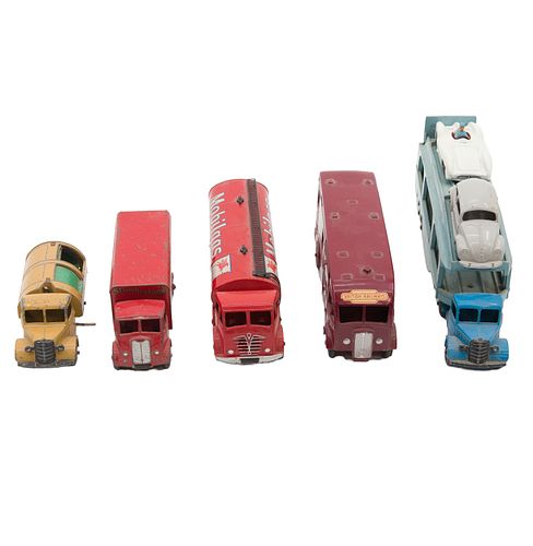 Eight Dinky Toys 1:43 model trucks, buses and cars.