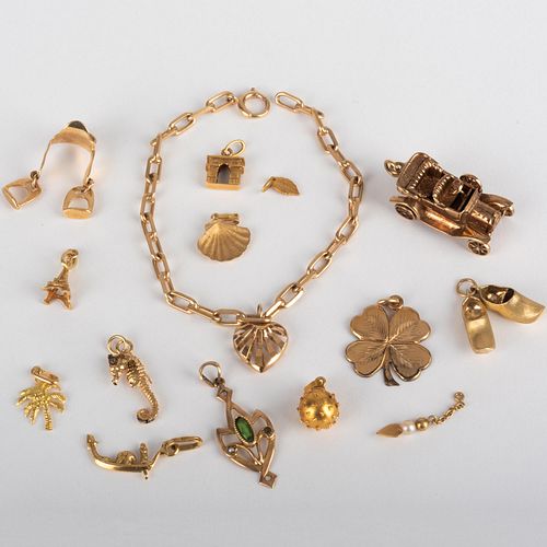 14k Gold Link Bracelet and a Group of Miscellaneous Gold Charms