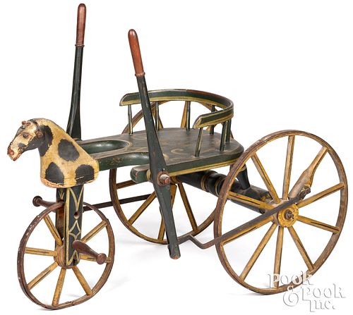 Hand-propelled carved and painted horse velocipede