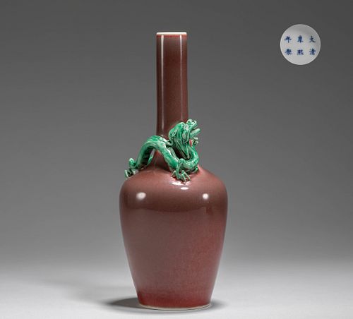 A SANG DE BOEUF-GLAZED BOTTLE VASE WITH TURQUOISE COILED DRAGON