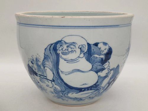 A Qing Dynasty blue and white jardiniere with Arhats