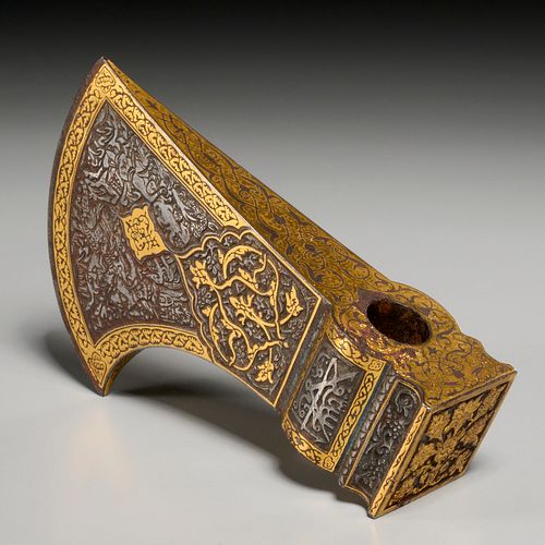 Fine Safavid gold-inlaid steel saddle-axehead