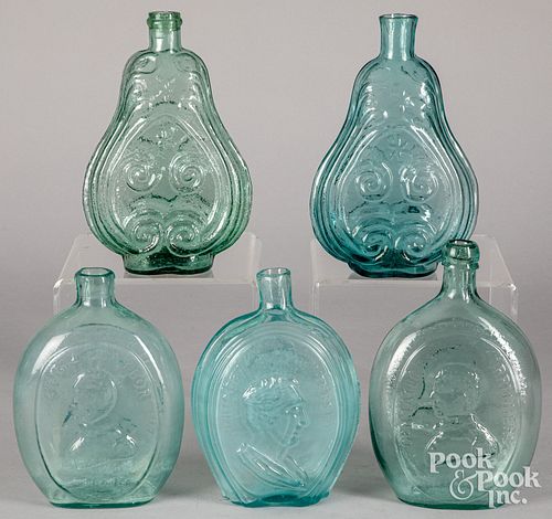 Five aqua glass flasks