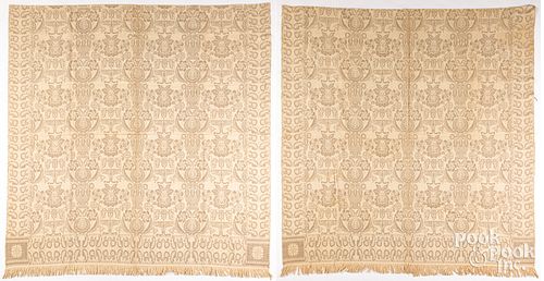 Pair of beige jacquard coverlets, 19th c.