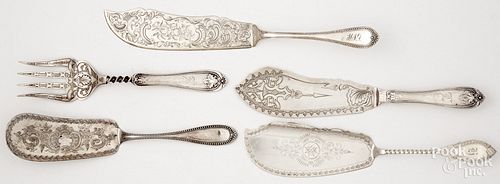 Five coin silver serving utensils