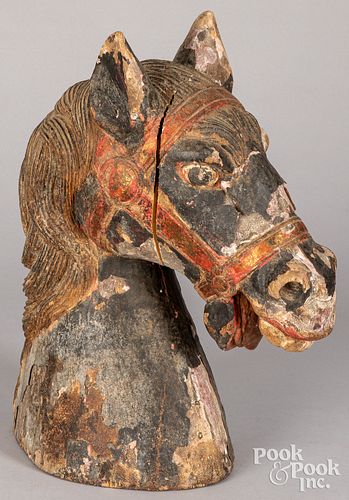Carved and painted horse head