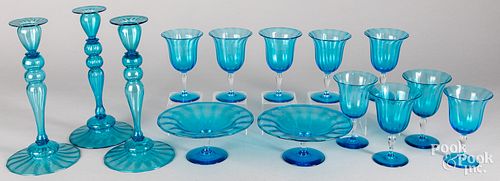 Blue glass stemware and candlesticks