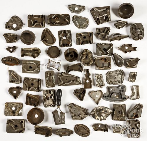 Large collection of tin cookie cutters