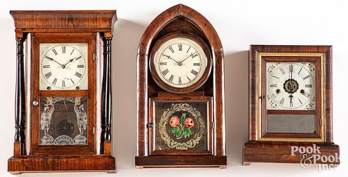 Three rosewood mantle clocks