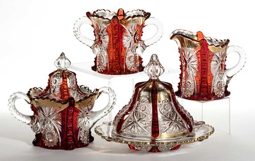 BUTTRESSED SUNBURST - RUBY-STAINED FOUR-PIECE TABLE SET