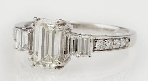 Lady's Platinum Dinner Ring, with an emerald cut 1