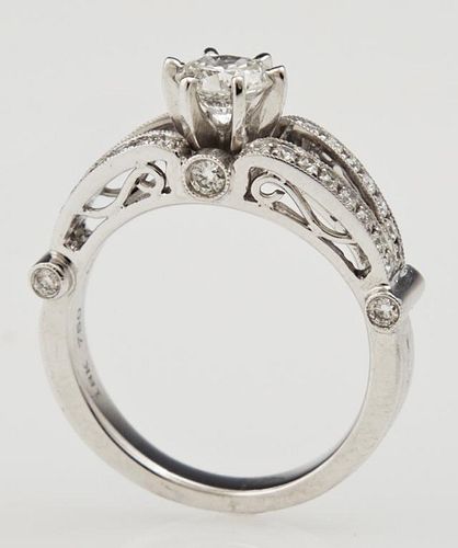 Lady's 18K White Gold Dinner Ring, with a central