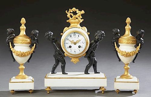 French Gilt and Patinated Bronze Three Piece Clock