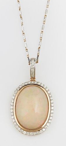 14K Yellow Gold Pendant, with a 22.87 carat oval c