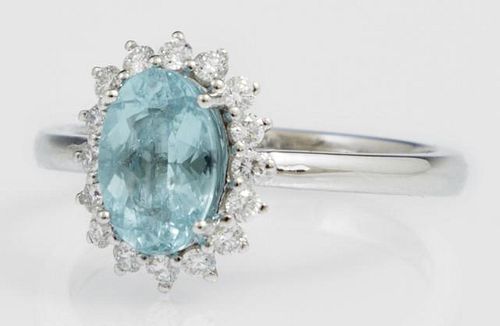 Lady's Platinum Dinner Ring, with an oval blue tou