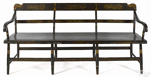 Rare pair of Pennsylvania painted settees, mid 19th c., 33 1/2'' h., 71 1/2'' w.