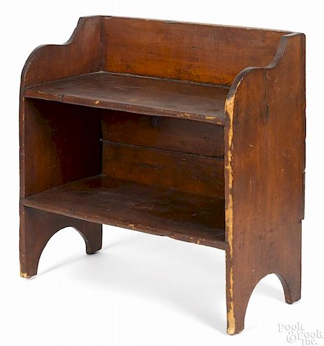 Stained pine bucket bench, 19th c., retaining an old red surface, 30'' h., 30 3/4'' w.