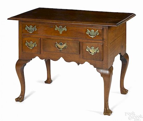 Pennsylvania Queen Anne walnut dressing table, ca. 1765, with four drawers and trifid feet