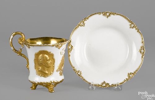 Meissen porcelain cabinet cup and saucer of American interest, ca. 1876, with relief busts