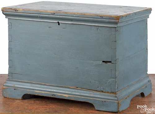 Miniature painted pine blanket chest, 19th c., retaining an old blue surface, 13 1/2'' h.