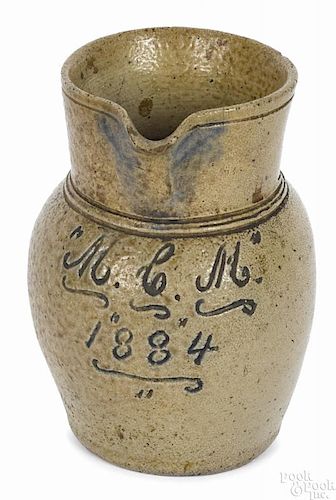 Pennsylvania miniature stoneware pitcher, inscribed M.C.M. 1884, 4 1/2'' h.