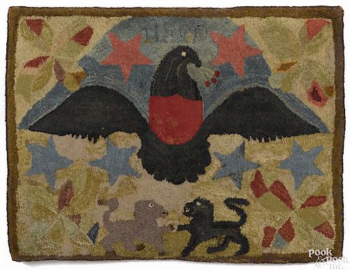 American hooked rug, 19th c., with a large spread winged eagle above two lions, 36'' x 48''.
