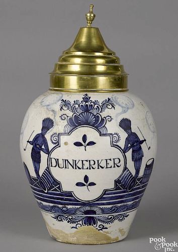 Dutch Delft tobacco jar, 18th c., inscribed Duinkerker in between two Native Americans