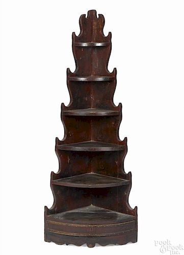 Painted pine corner shelf, early 19th c., with spurred sides and a single drawer in the base