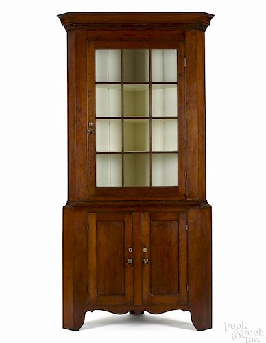 Pennsylvania Federal two-part cherry corner cupboard, early 19th c., 93'' h., 43 1/2'' w.