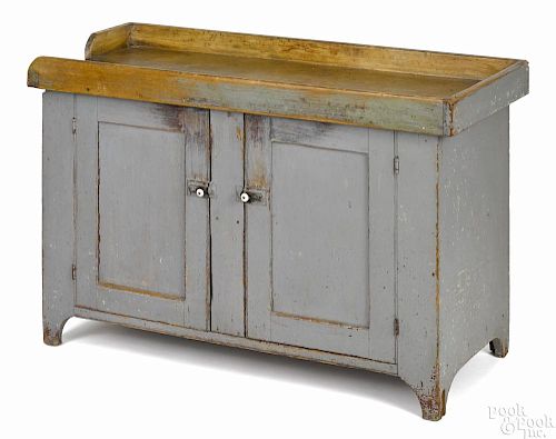 Painted pine drysink, 19th c., retaining an old blue/gray surface, 32'' h., 49 1/4'' w.
