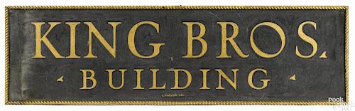 Painted pine trade sign for King Bros Building, signed L. Fallon Co. lower middle